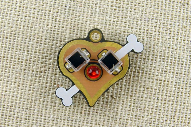 Solar powered flashing LED heart pendant, earrings