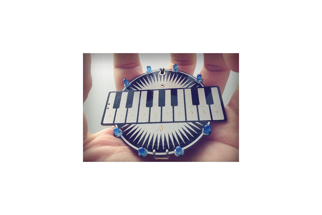 Programmable keyboard badge - lightning and music 1