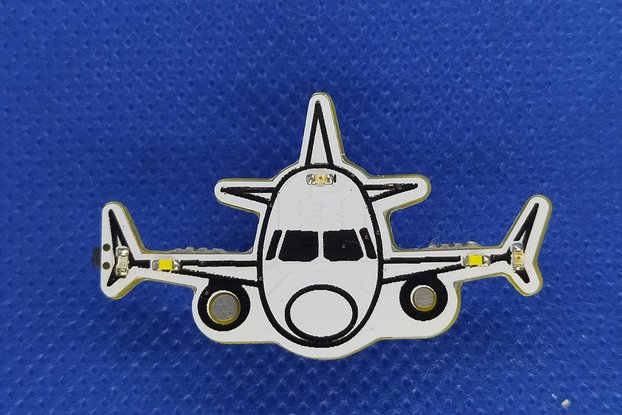 Airplane pin badge