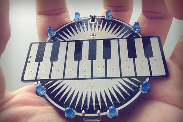 Programmable keyboard badge - lightning and music