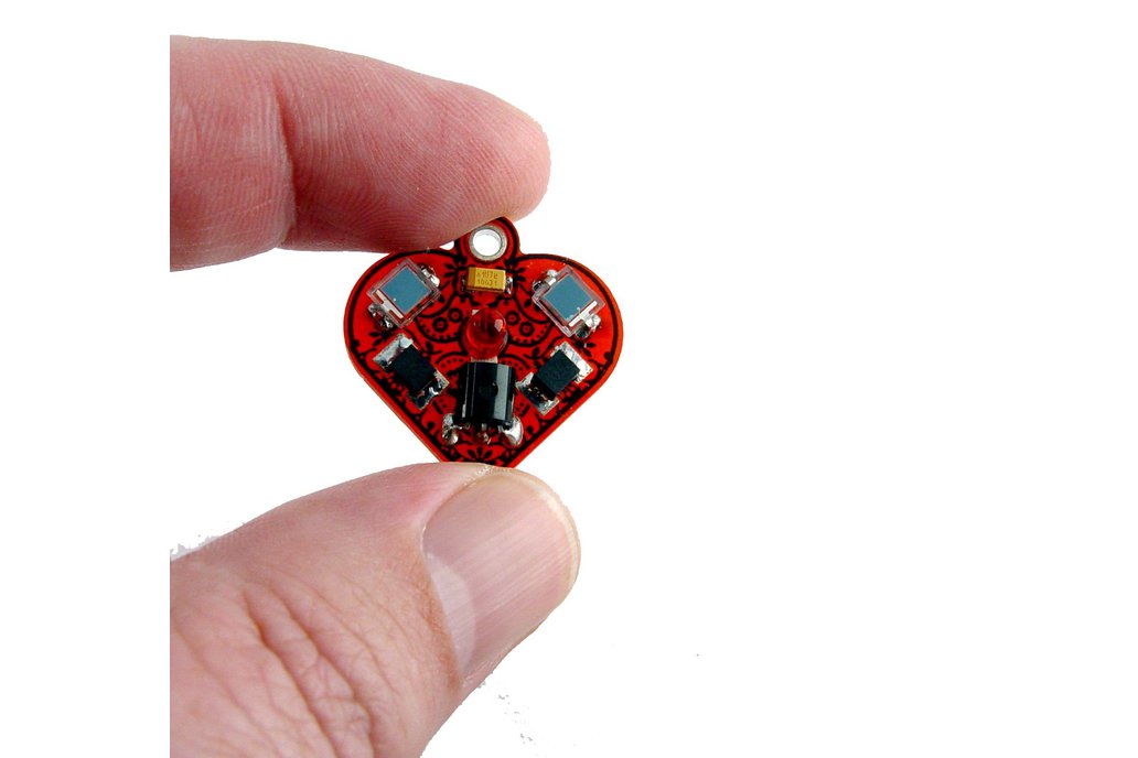 Solar powered flashing LED heart earrings 1