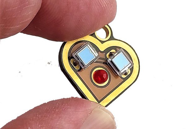 Solar powered flashing LED small heart earrings