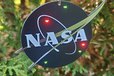 2022-11-04T16:17:36.578Z-NASA Ornament Front.jpg
