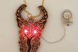 2022-12-07T20:10:12.920Z-glowing eye with chain.png