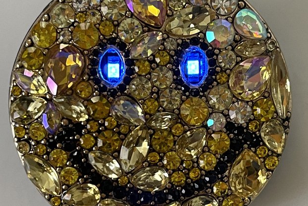 Smiling Pin with LED Eyes